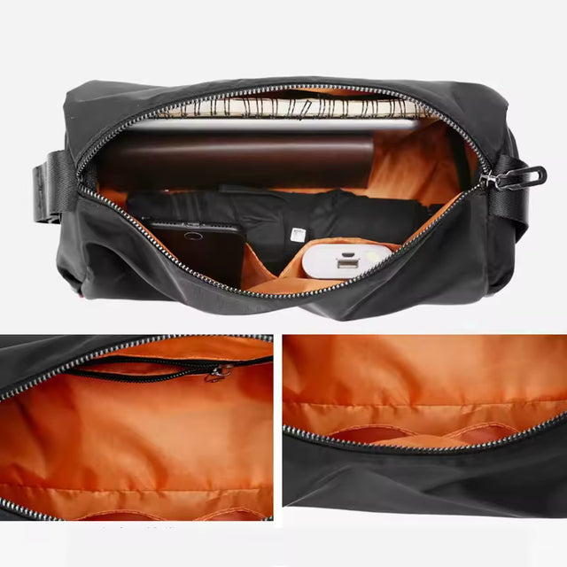 Interior view of a versatile black gym bag featuring a high-visibility orange lining, multiple internal organization pockets, a secure zippered compartment, and storage space for a notebook, power bank, and smartphone.
