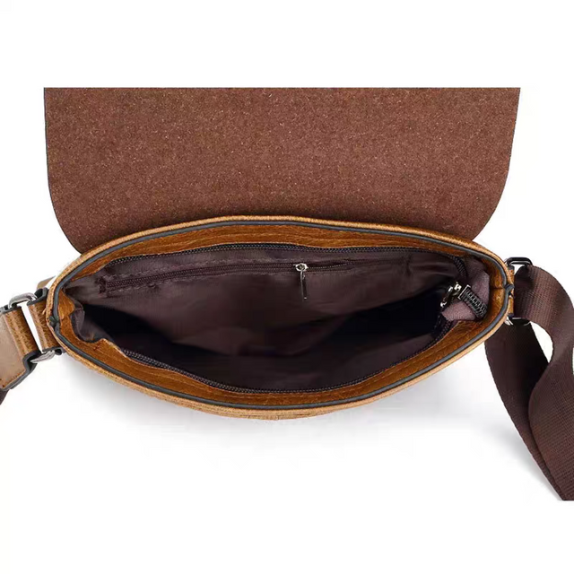 interior view of the Jeep Buluo crossbody bag, showing the spacious main compartment and secure zipper closure for organized storage.