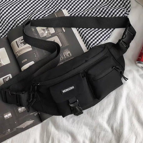 Sleek black Japanese aesthetic chest bag, unisex utility sling pack for urban fashion and gym essentials.