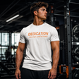 Fitness athlete wearing a white Dedication Has No Limitations gym T-shirt