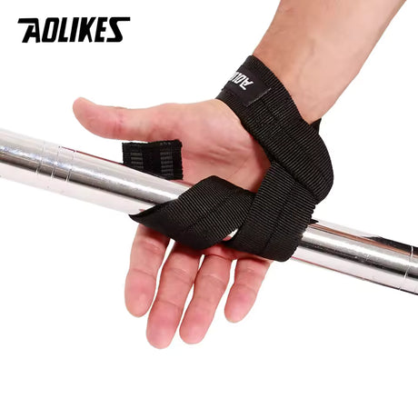 Close-up of a weightlifter's hand using an AOLIKES lifting strap wrapped securely around a chrome barbell.