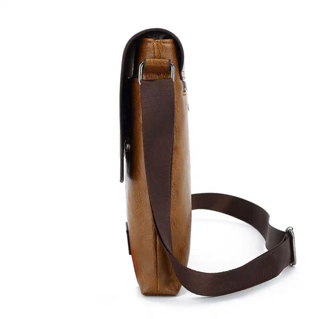 Side profile view of the Jeep Buluo men's crossbody bag, showcasing the slim design and sturdy, adjustable shoulder strap