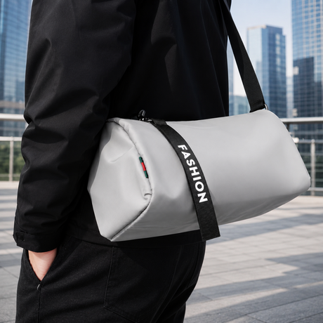 Queshark light grey waterproof nylon mini crossbody gym bag for men and women featuring a black 'FASHION' zipper strap and adjustable shoulder strap.