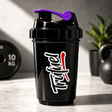 Glossy jet black protein shaker bottle with purple lid for gym and fitness