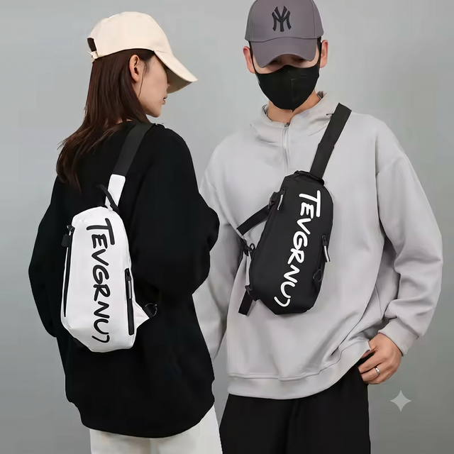 Waterproof crossbody chest bag in black. Compact gym sling pack (30cm x 14cm x 17cm) for fitness, travel, and daily essentials.